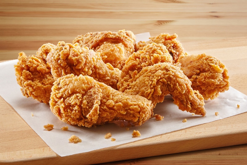 fried chicken on wooden table